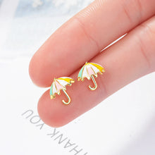 Boucles d’oreilles parapluie doré pour petite fille