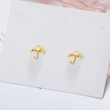 Boucles d’oreilles parapluie doré pour petite fille