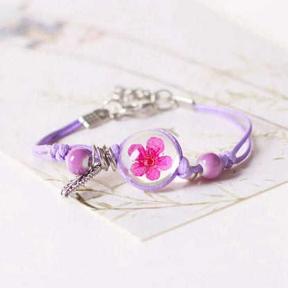 Bracelet à cordon avec pendentif en perle transparente