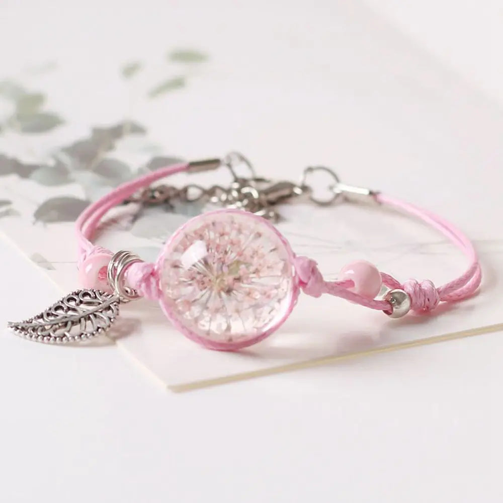 Bracelet à cordon avec pendentif en perle transparente