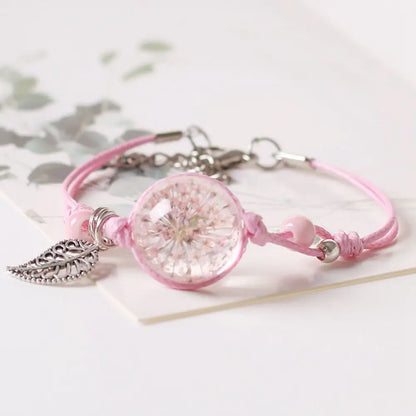 Bracelet à cordon avec pendentif en perle transparente