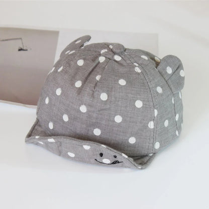 Bonnet casquette à pois avec oreille