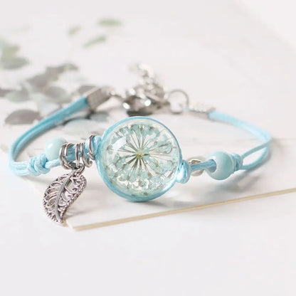 Bracelet à cordon avec pendentif en perle transparente