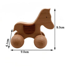 Jouet Montessori en bois cheval à roulettes