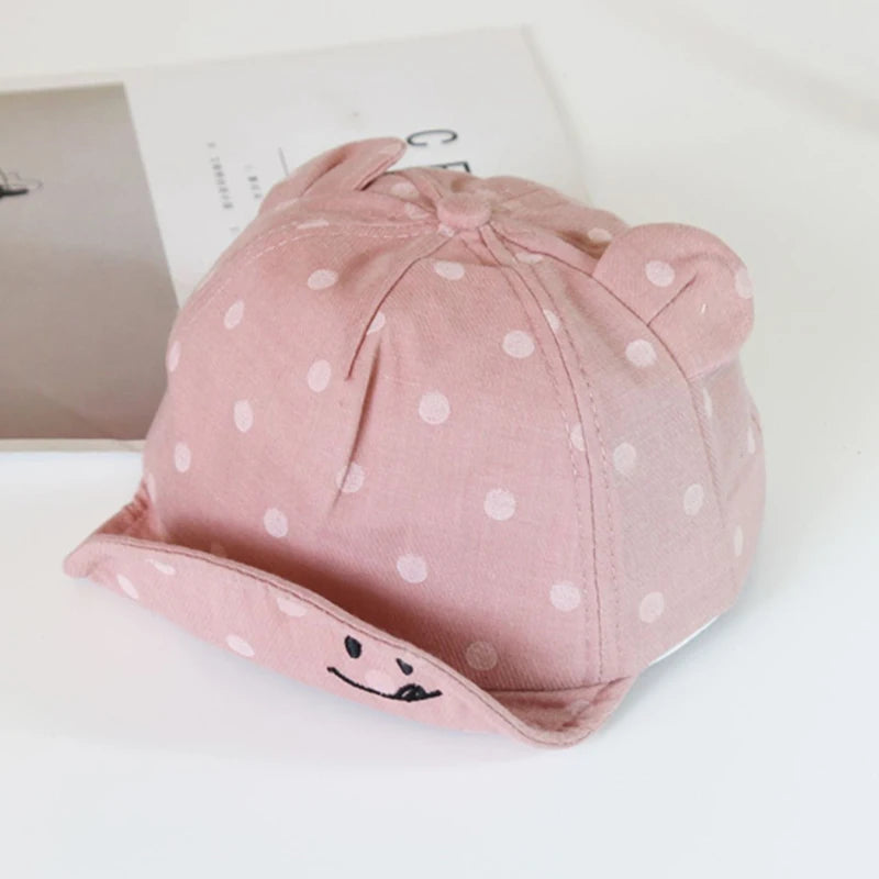 Bonnet casquette à pois avec oreille