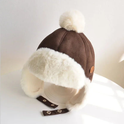 Cagoule bonnet avec protège oreille et pompon