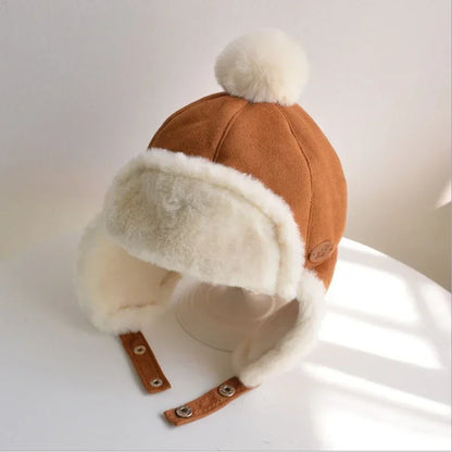 Cagoule bonnet avec protège oreille et pompon