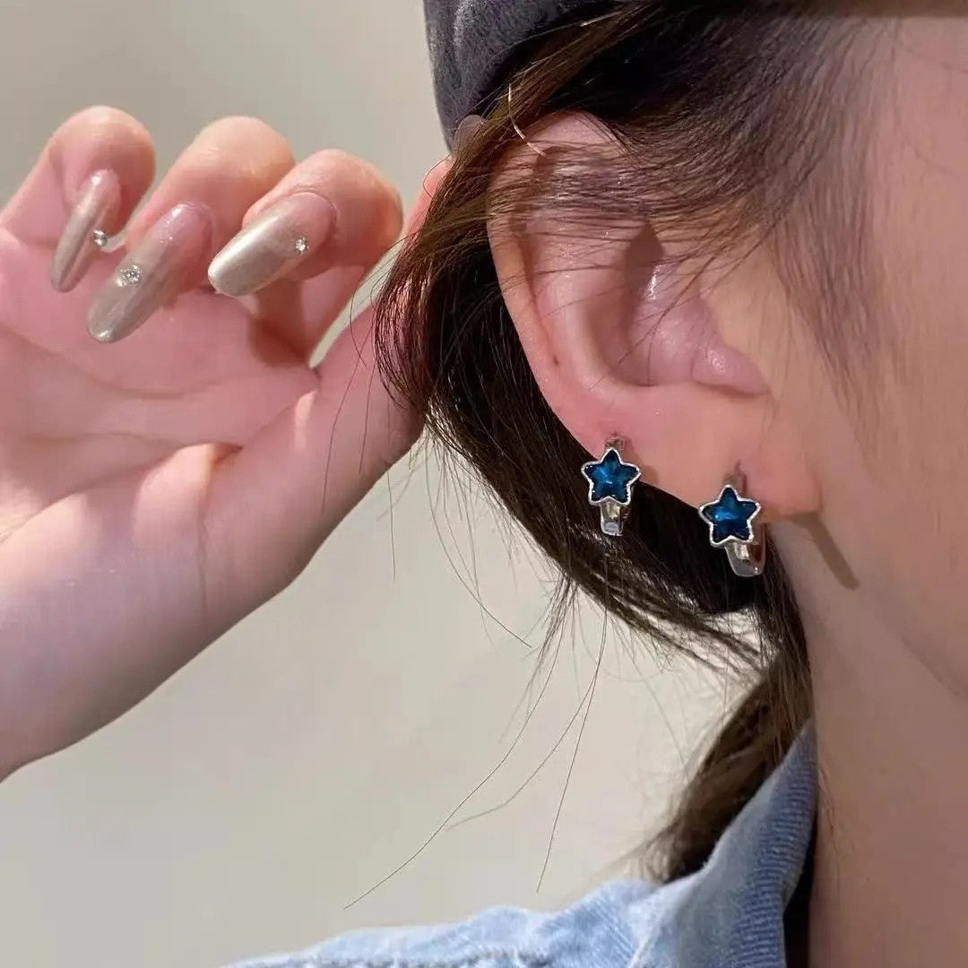 Boucle d’oreilles à motif étoile bleu cristal