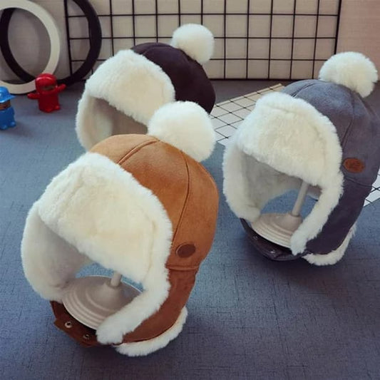 Cagoule bonnet avec protège oreille et pompon