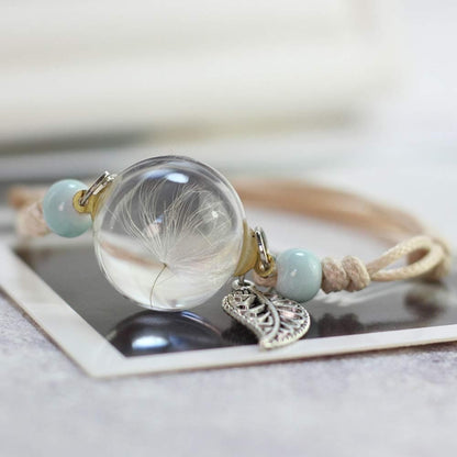 Bracelet à cordon avec pendentif en perle transparente